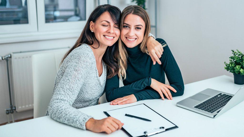 Image of two people acting as a work bestie